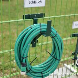 EINDREHHALTERUNG ALS SCHLAUCHHALTER - STANDARD - GRÜN RAL 6005
